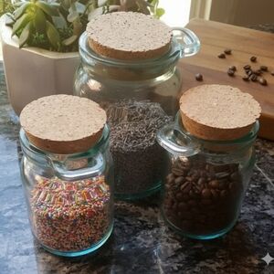 3 glass storage jars